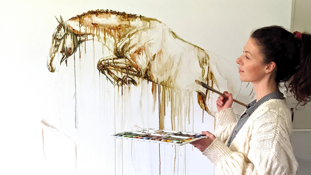 jumping horse left with Marjo Lebbe painting on the right